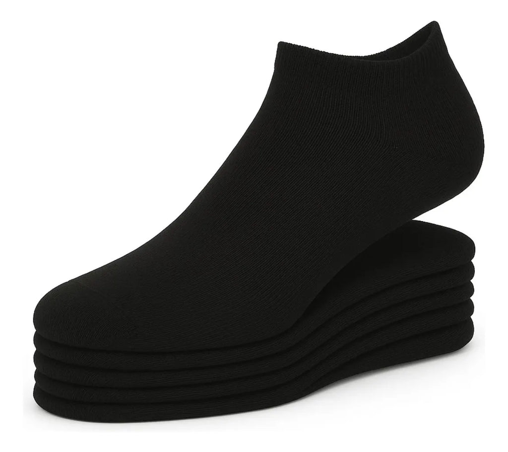 Stack of black ankle socks on a white background